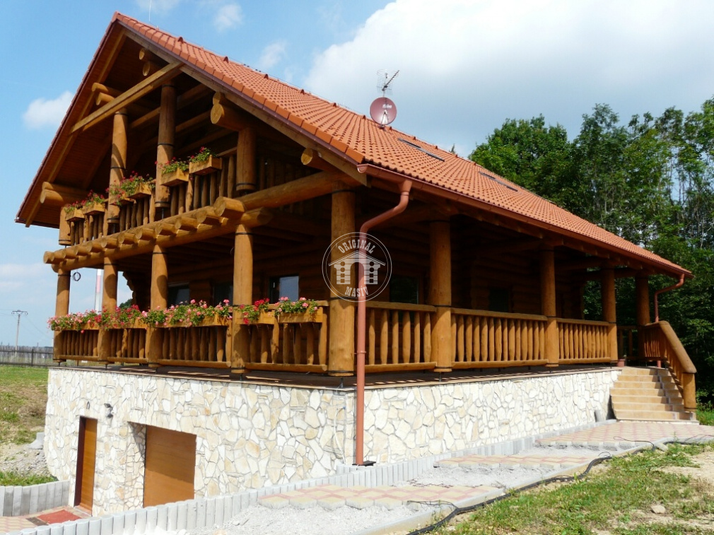 Blockbau – Einfamilienhaus mit Garage