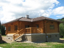 Blockbau – ebenerdiger Bungalow